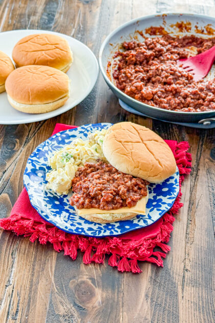Plate of Mom’s sloppy joes served on soft buns with the classic sweet and savory meat mixture