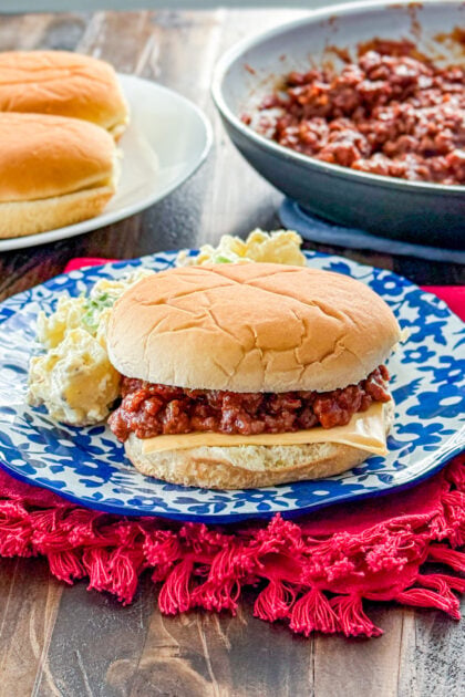 Close-up of Mom’s sloppy joes on a bun with saucy ground beef filling