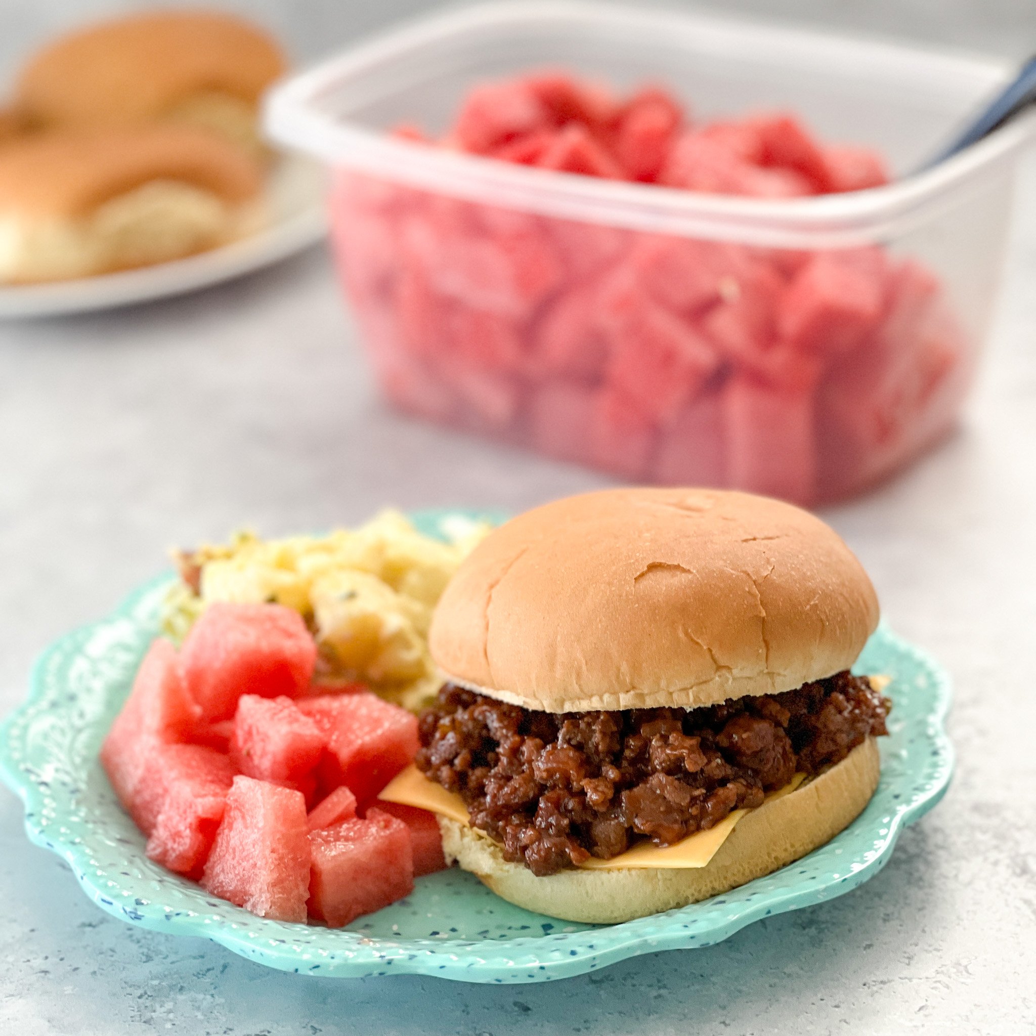 Easy Cheesy Barbecued Sloppy Joe on a melamine plate