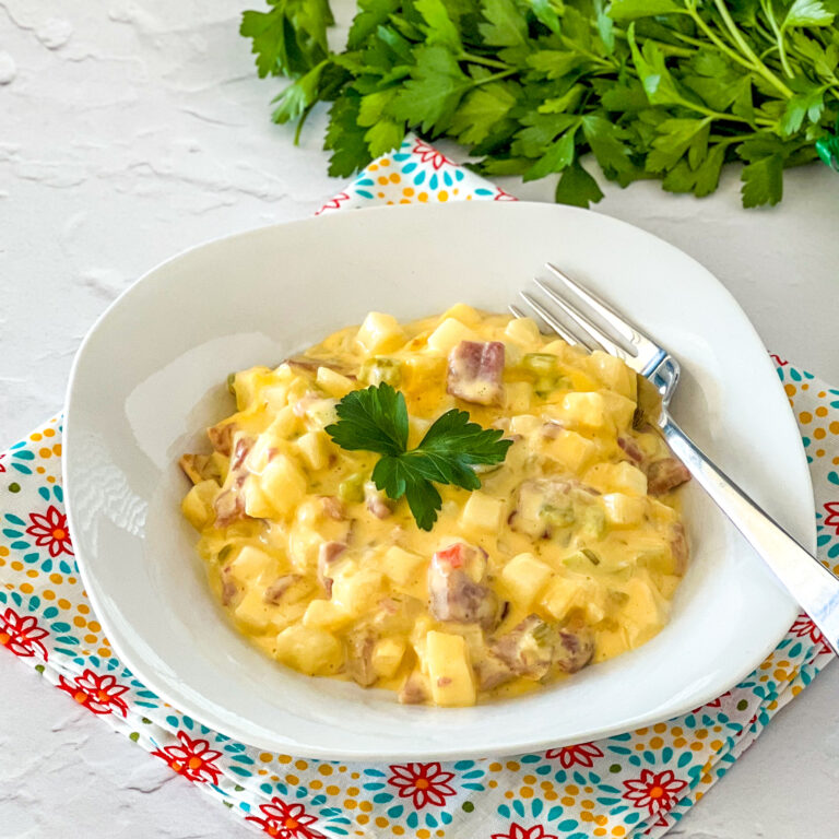 ham and cheese potato casserole served up in a bowl