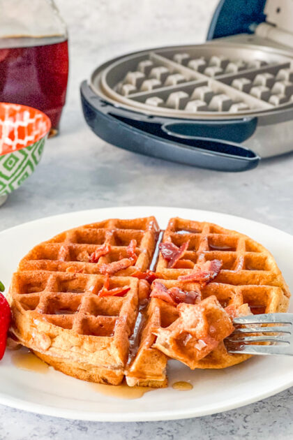 bacon cinnamon waffle with bite on fork