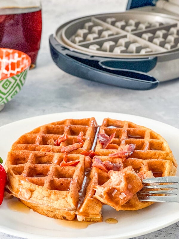 bacon cinnamon waffle with bite on fork