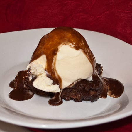 hot fudge pudding picture of hot fudge pudding topped with ice cream