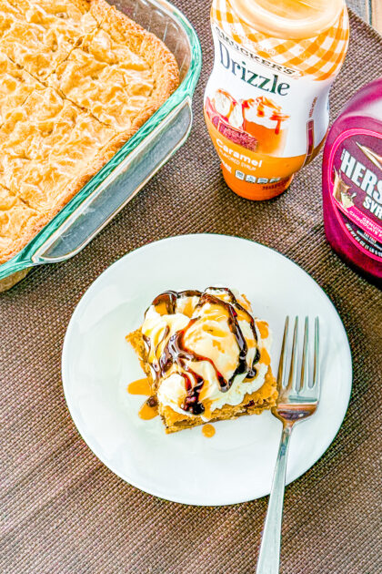 Copycat Chocolate Chip Paradise Pie topped with ice cream and dessert sauces
