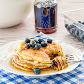 stack of blueberry Banana Pancake with bite cut out