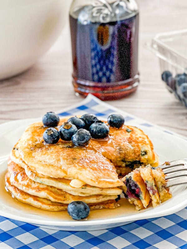 stack of blueberry Banana Pancake with bite cut out