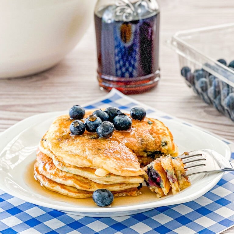 stack of blueberry Banana Pancake with bite cut out