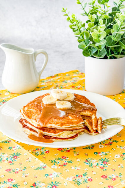 yogurt pancakes topped with peanut butter syrup