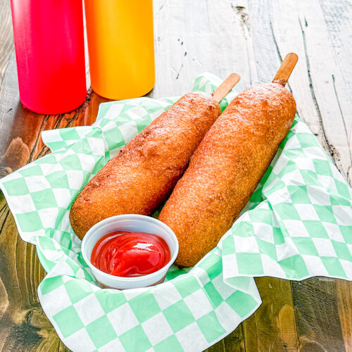 Homemade corn dogs with golden cornbread coating