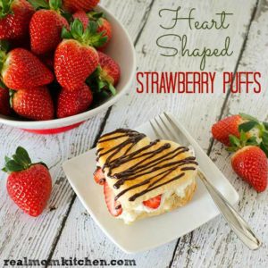 Puff pastry hears frilled with pastry cream and sliced strawberries
