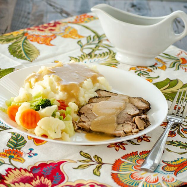 Easy Crock Pot Pork Roast with Gravy | realmomkitchen.com