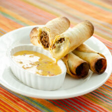 Baked Beef Flautas with Queso Dip | realmomkitchen.com