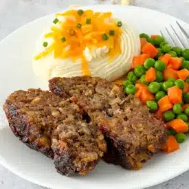 Stove Top Stuffing Meatloaf slices on a plate