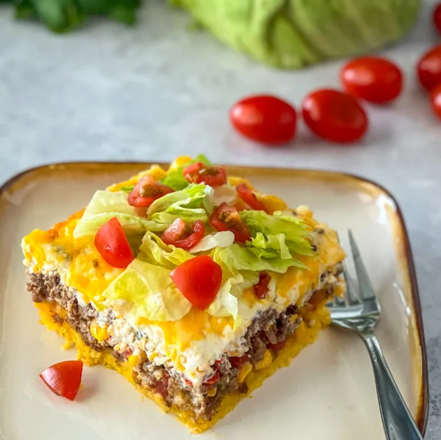 square of cornbread taco bake on plate