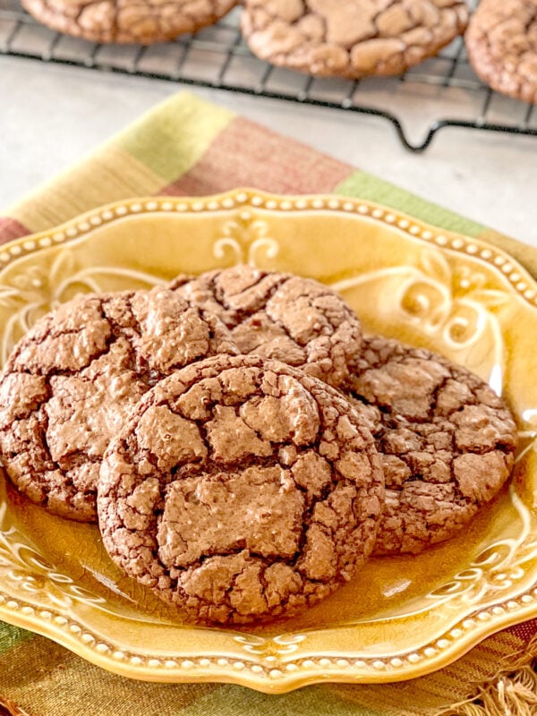 close up of Fudgy Brownie Cookies on yellow plate