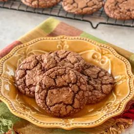 close up of Fudgy Brownie Cookies on yellow plate