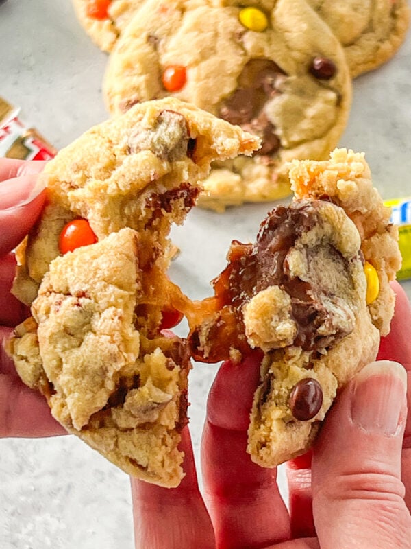 Halloween Candy Cookie being broken in half