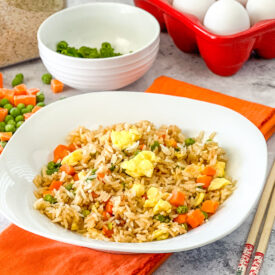 Easy Fried Rice made with leftover rice, peas, carrots, and scrambled eggs