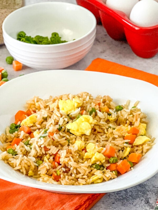 Easy Fried Rice made with leftover rice, peas, carrots, and scrambled eggs