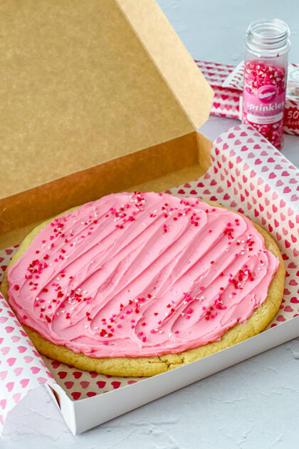 Giant Frosted Sugar Cookie in a pizza box