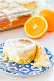 open 90 minute orange roll on a blue plate
