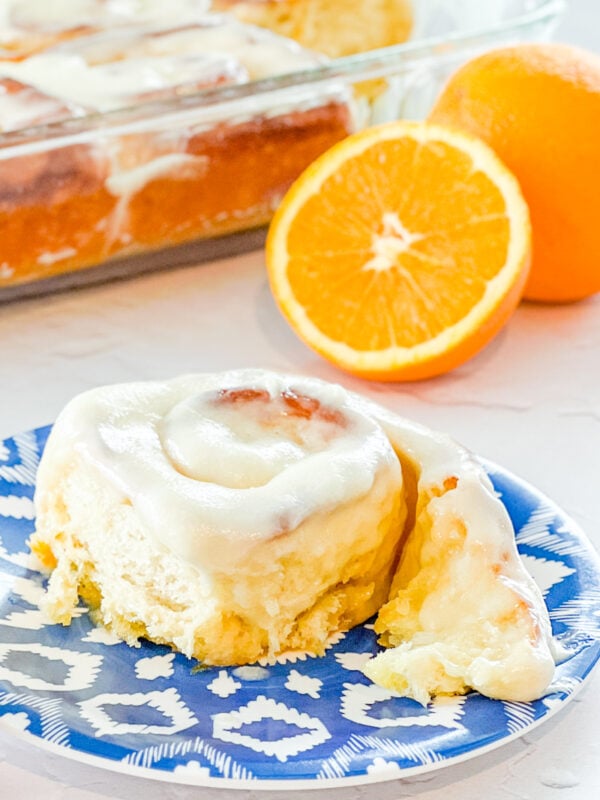 open 90 minute orange roll on a blue plate