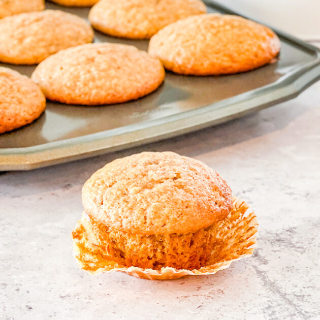 cinnamon banana muffin in unwrapped paper liner