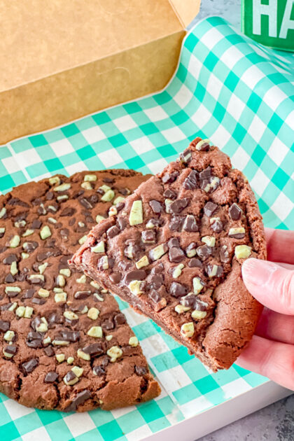 Giant chocolate mint cookie cut into slice