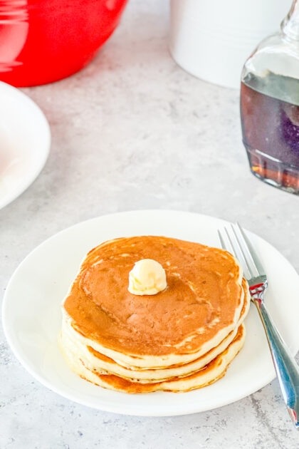 Overnight Buttermilk Pancakes with butter on top