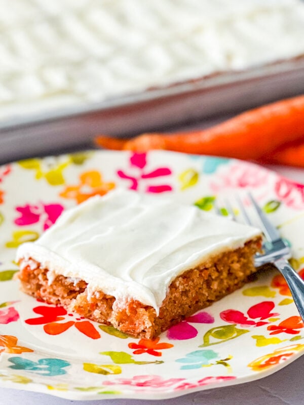 Sheet Pan Carrot cake slice on a floral plate