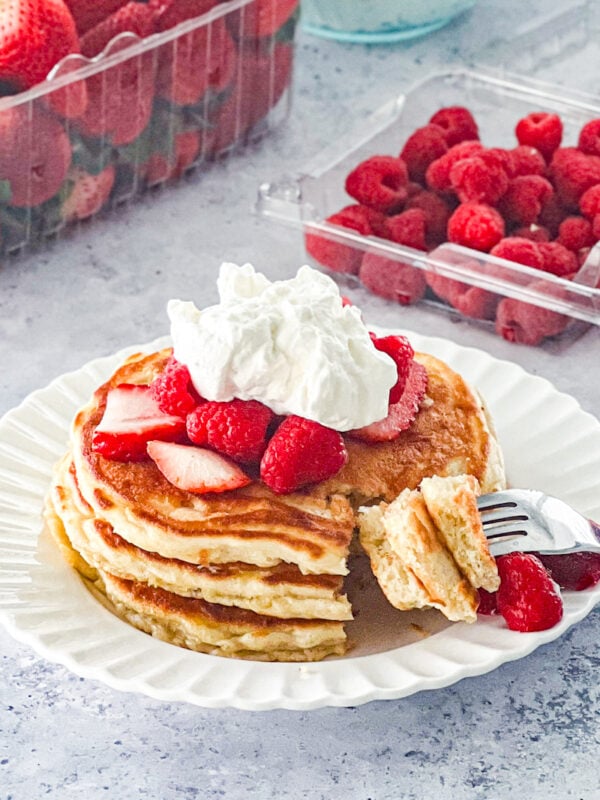 Amish buttermilk pancakes with bite cut on fork