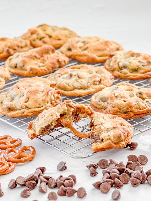 gooey caramel center of salted caramel pretzel chocolate chip cookie