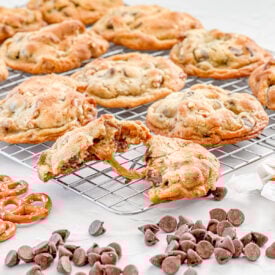 upclose of the inside of a salted caramel pretzel chocolate chip cookies