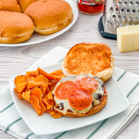 grilled pizza burger before top bun put on