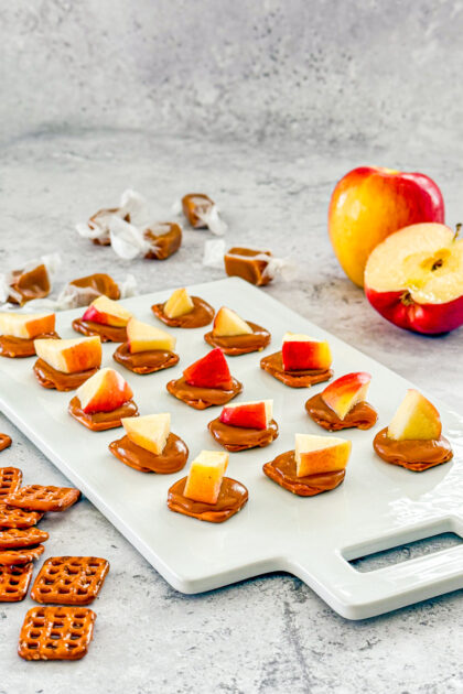 preztel snaps topped with caramel and apple
