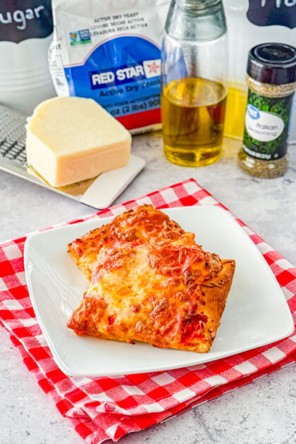 fished slices of focaccia pepperoni pizza