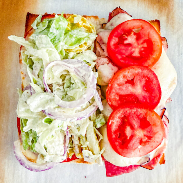 grinder topped with grinder salad