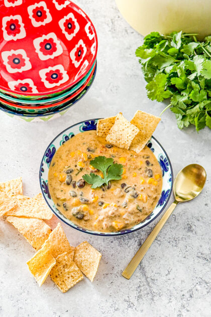 cheesy soup made with ground beef, beans, corn, and queso