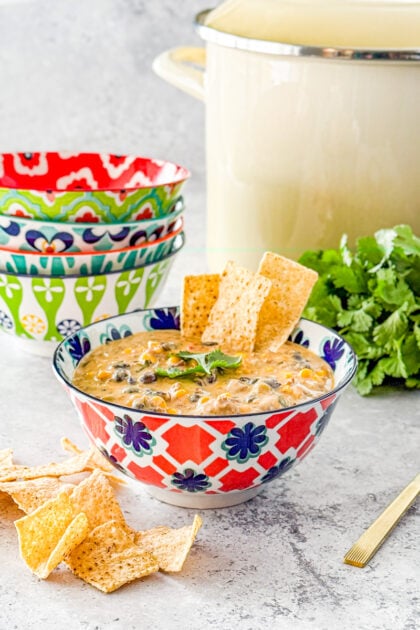 chili made with ground beef, chili con queso, black beans, and corn