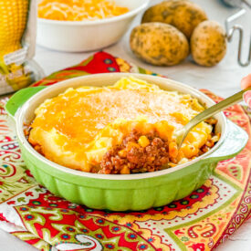 sloppy joe meat topped with mashed potatoes and cheese