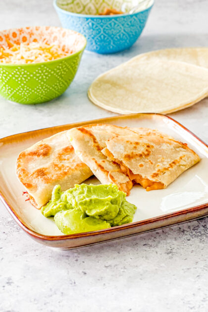 Crispy Cheesy Refried Bean Tacos
