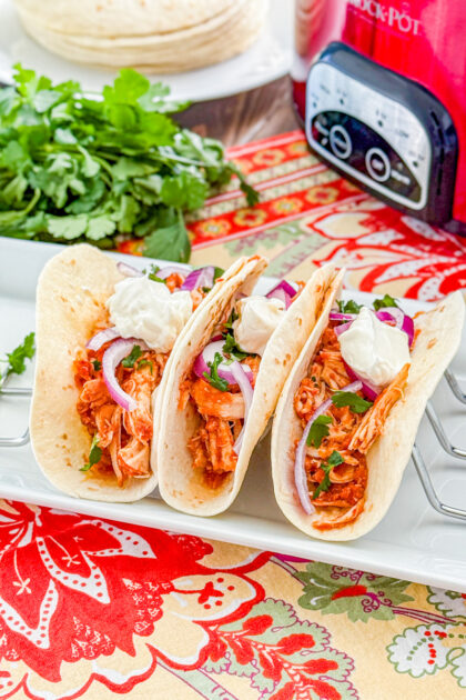 slow cooker chicken tinga tacos delish