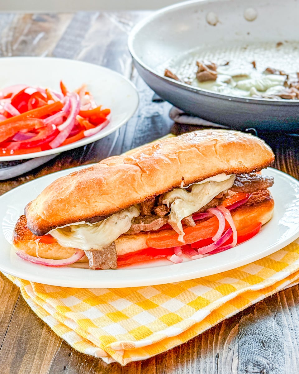 Philly Cheesesteaks with Peppers and Onions - Real Mom Kitchen