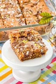Close up of brown butter Cadbury Egg cookie bars with candy pieces on top
