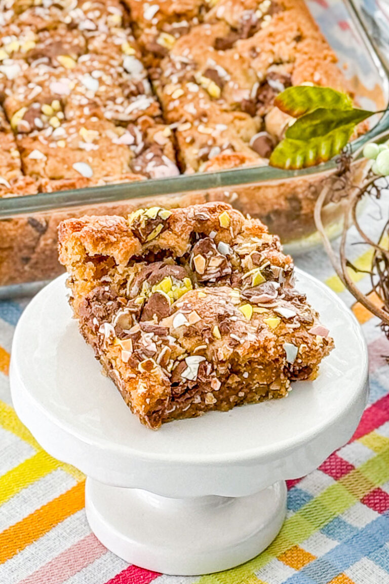 Close up of brown butter Cadbury Egg cookie bars with candy pieces on top