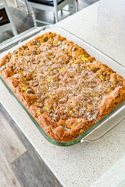 Chewy brown butter Cadbury Egg cookie bars in a baking pan
