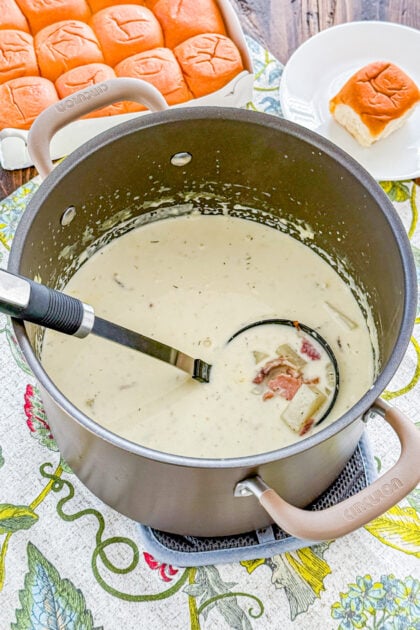 Pot of creamy ham and potato soup with tender potatoes and diced ham