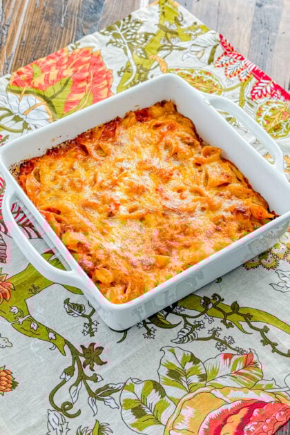 Cheeseburger pasta bake topped with melted cheese in a baking dish