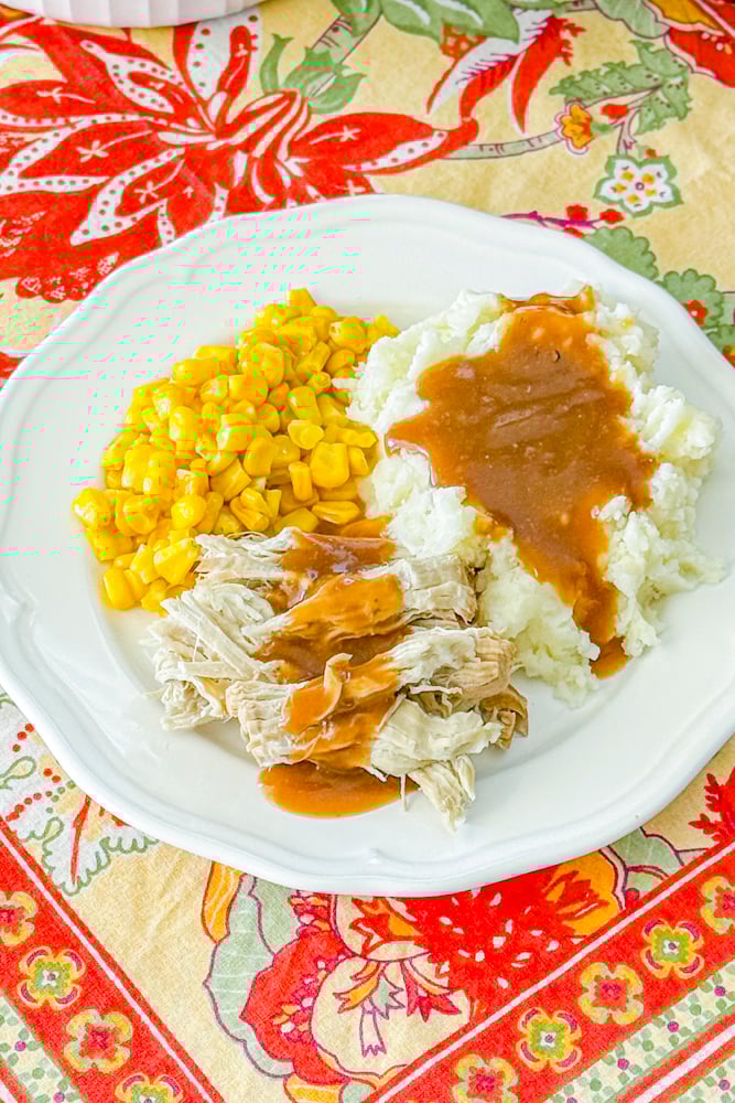 Instant Pot pork roast sliced and served with gravy