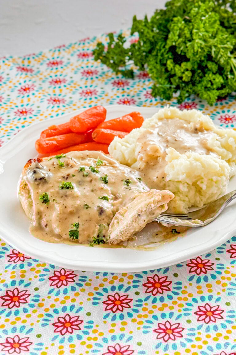 Oven baked buttermilk chicken with creamy gravy served with mashed potatoes